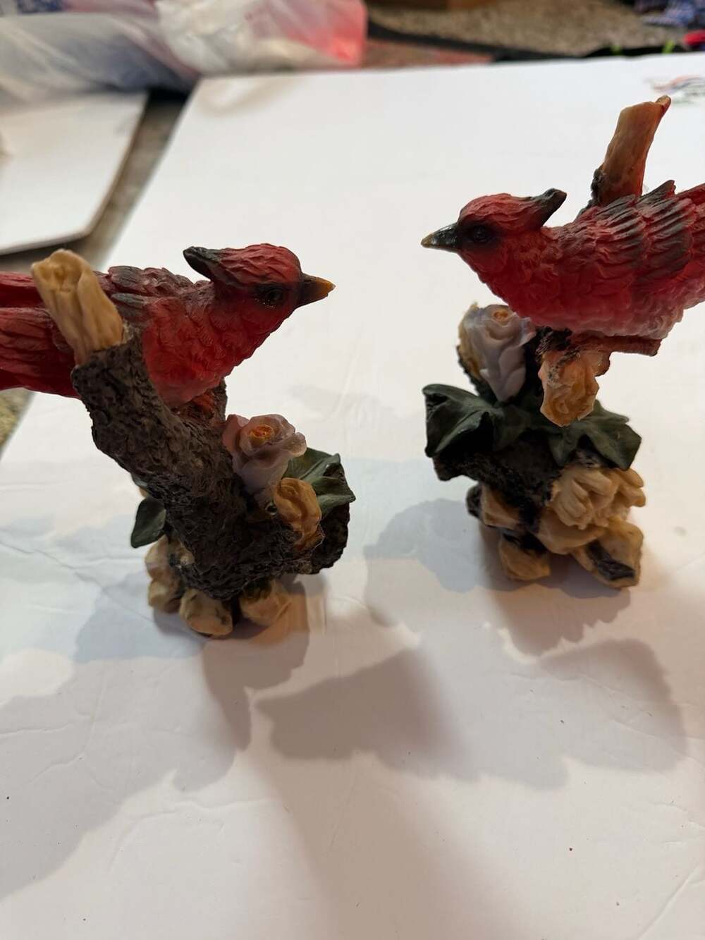 Pair of Decorative Hand-Painted Red Cardinal Bird Figurines on Tree Branches
